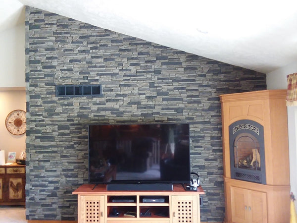 Lightning Ridge faux stone panel in Grey Fox – fireplace surround and living room