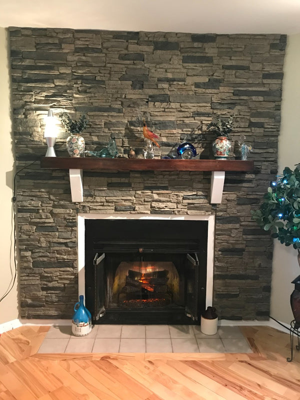 Lightning Ridge faux stone panel in Nature's Spirit – fireplace surround and living room installed by a DIY homeowner