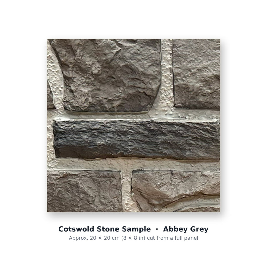 Cotswold Stone sample piece in Abbey Grey, cut from the full faux limestone panel