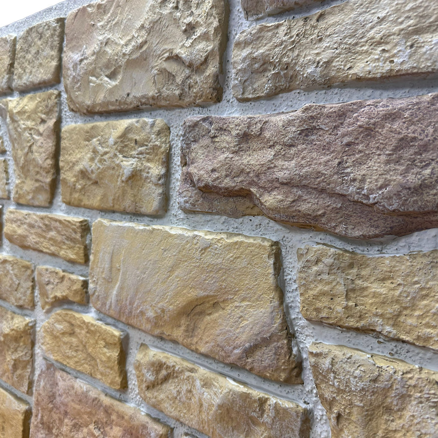 Close-up of Cotswold Stone in Heritage Gold showing the ochre and aged earth tones