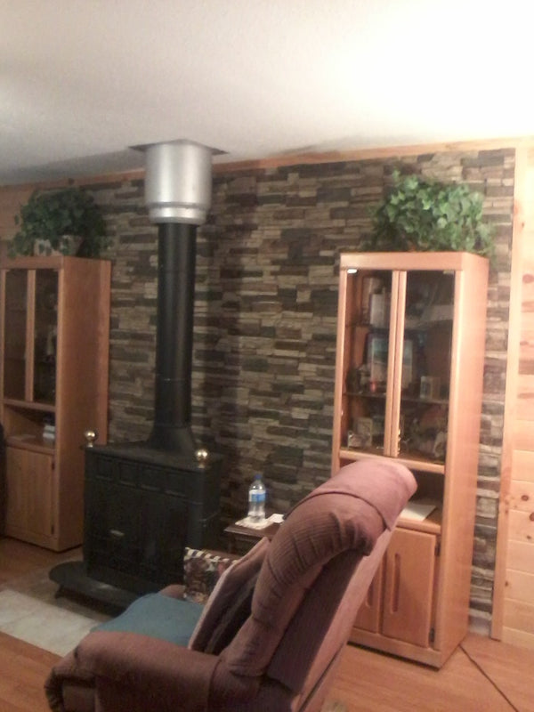 Lightning Ridge faux stone panel in Nature's Spirit – log burner wall and living room